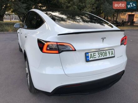 Белый Тесла Model Y, объемом двигателя 0 л и пробегом 82 тыс. км за 23000 $, фото 1 на Automoto.ua