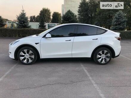 Білий Тесла Model Y, об'ємом двигуна 0 л та пробігом 82 тис. км за 31700 $, фото 1 на Automoto.ua