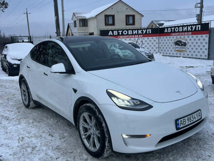 Белый Тесла Model Y, объемом двигателя 0 л и пробегом 128 тыс. км за 19999 $, фото 1 на Automoto.ua