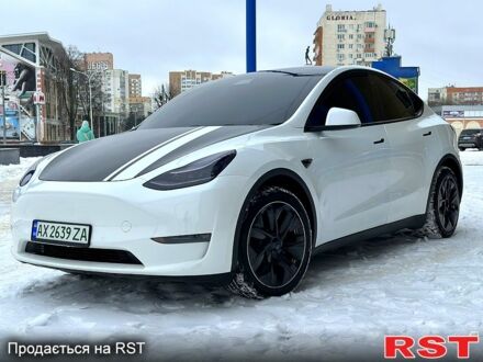 Білий Тесла Model Y, об'ємом двигуна 0 л та пробігом 120 тис. км за 32000 $, фото 1 на Automoto.ua