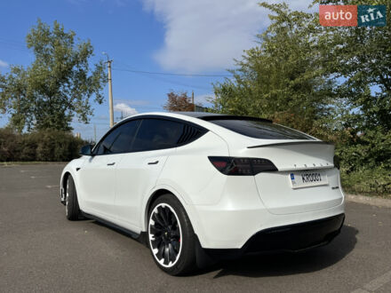 Білий Тесла Model Y, об'ємом двигуна 0 л та пробігом 126 тис. км за 25999 $, фото 1 на Automoto.ua