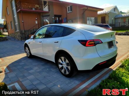 Білий Тесла Model Y, об'ємом двигуна 0.26 л та пробігом 110 тис. км за 20900 $, фото 1 на Automoto.ua