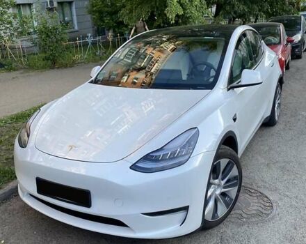 Белый Тесла Model Y, объемом двигателя 0 л и пробегом 49 тыс. км за 24850 $, фото 1 на Automoto.ua