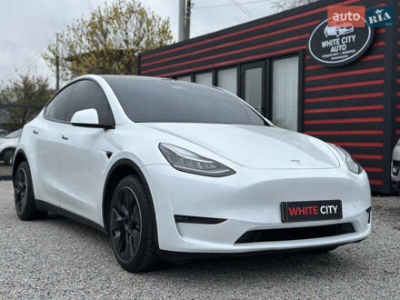 Білий Тесла Model Y, об'ємом двигуна 0 л та пробігом 66 тис. км за 19500 $, фото 1 на Automoto.ua