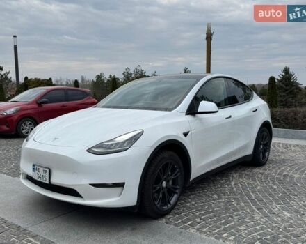 Белый Тесла Model Y, объемом двигателя 0 л и пробегом 77 тыс. км за 23000 $, фото 1 на Automoto.ua