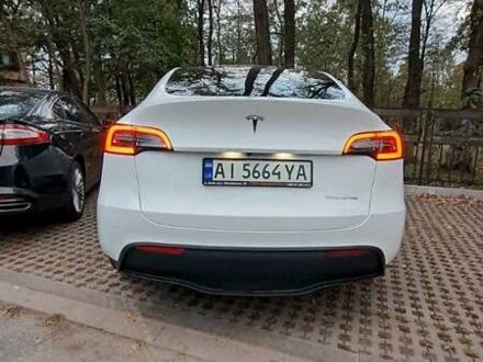 Білий Тесла Model Y, об'ємом двигуна 0 л та пробігом 84 тис. км за 21900 $, фото 1 на Automoto.ua