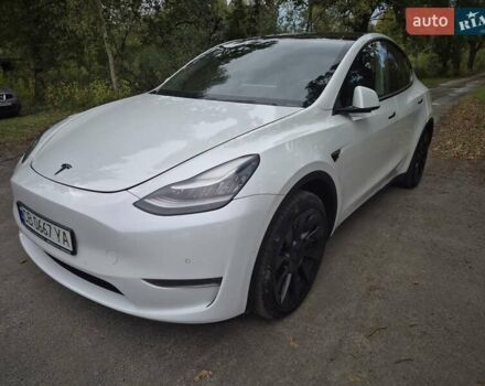 Білий Тесла Model Y, об'ємом двигуна 0 л та пробігом 104 тис. км за 23500 $, фото 1 на Automoto.ua