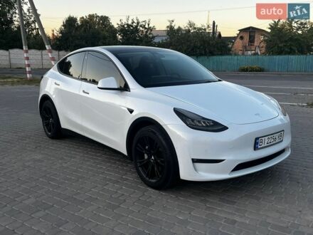 Белый Тесла Model Y, объемом двигателя 0 л и пробегом 92 тыс. км за 23500 $, фото 1 на Automoto.ua