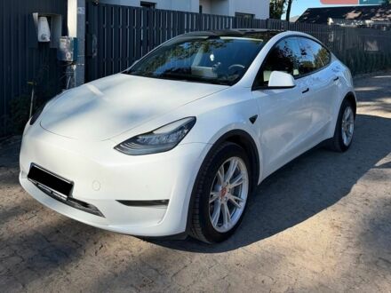 Белый Тесла Model Y, объемом двигателя 0 л и пробегом 88 тыс. км за 23500 $, фото 1 на Automoto.ua