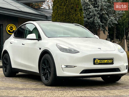 Білий Тесла Model Y, об'ємом двигуна 0 л та пробігом 88 тис. км за 26800 $, фото 1 на Automoto.ua