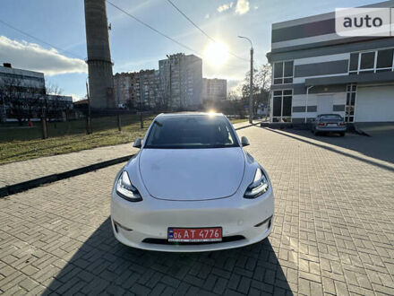 Белый Тесла Model Y, объемом двигателя 0 л и пробегом 61 тыс. км за 33500 $, фото 1 на Automoto.ua