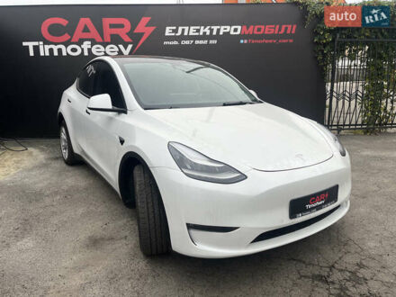 Белый Тесла Model Y, объемом двигателя 0 л и пробегом 56 тыс. км за 25000 $, фото 1 на Automoto.ua