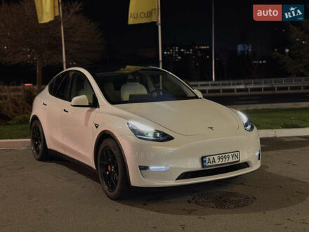 Белый Тесла Model Y, объемом двигателя 0 л и пробегом 70 тыс. км за 23500 $, фото 1 на Automoto.ua