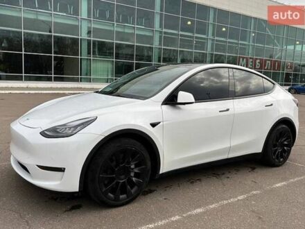 Белый Тесла Model Y, объемом двигателя 0 л и пробегом 55 тыс. км за 28900 $, фото 1 на Automoto.ua