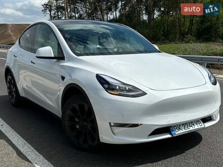 Белый Тесла Model Y, объемом двигателя 0 л и пробегом 55 тыс. км за 23000 $, фото 1 на Automoto.ua