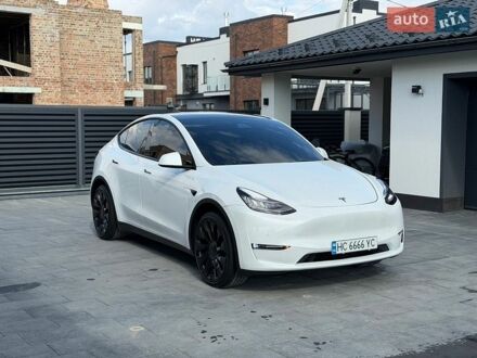 Белый Тесла Model Y, объемом двигателя 0 л и пробегом 96 тыс. км за 22800 $, фото 1 на Automoto.ua