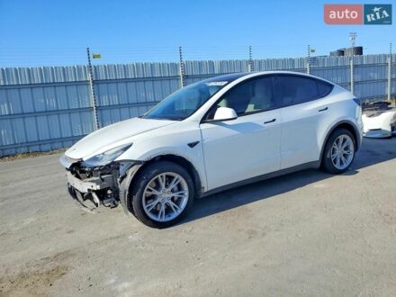 Белый Тесла Model Y, объемом двигателя 0 л и пробегом 50 тыс. км за 6500 $, фото 1 на Automoto.ua