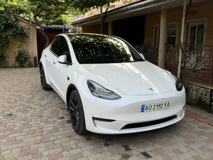 Белый Тесла Model Y, объемом двигателя 0 л и пробегом 78 тыс. км за 24000 $, фото 1 на Automoto.ua