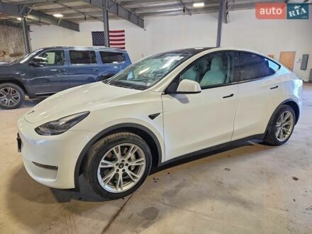 Белый Тесла Model Y, объемом двигателя 0 л и пробегом 75 тыс. км за 9400 $, фото 1 на Automoto.ua
