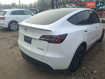 Белый Тесла Model Y, объемом двигателя 0 л и пробегом 75 тыс. км за 15000 $, фото 1 на Automoto.ua