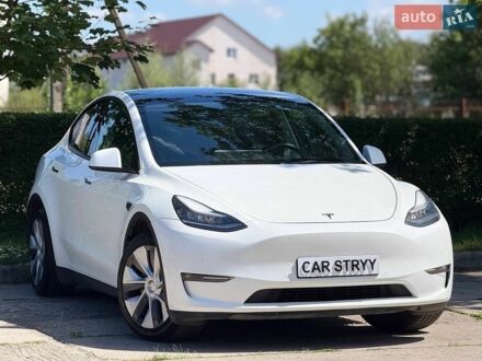 Белый Тесла Model Y, объемом двигателя 0 л и пробегом 51 тыс. км за 23999 $, фото 1 на Automoto.ua