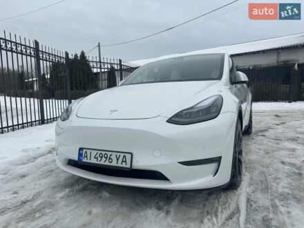 Білий Тесла Model Y, об'ємом двигуна 0 л та пробігом 88 тис. км за 28999 $, фото 1 на Automoto.ua