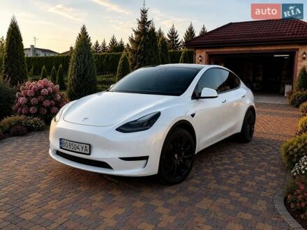 Білий Тесла Model Y, об'ємом двигуна 0 л та пробігом 71 тис. км за 24900 $, фото 1 на Automoto.ua