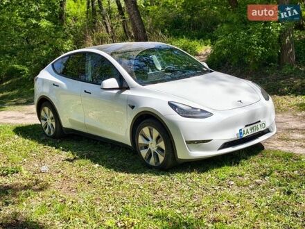 Белый Тесла Model Y, объемом двигателя 0 л и пробегом 128 тыс. км за 22900 $, фото 1 на Automoto.ua