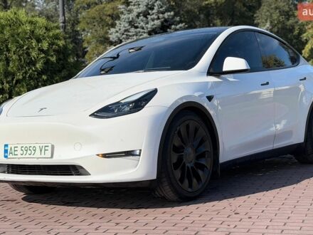 Білий Тесла Model Y, об'ємом двигуна 0 л та пробігом 92 тис. км за 26999 $, фото 1 на Automoto.ua