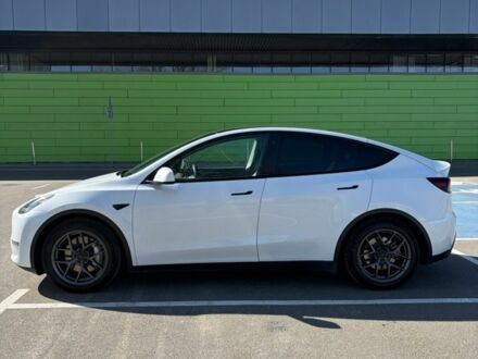 Білий Тесла Model Y, об'ємом двигуна 0 л та пробігом 73 тис. км за 26600 $, фото 1 на Automoto.ua