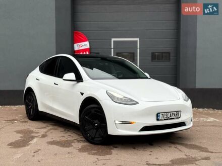 Білий Тесла Model Y, об'ємом двигуна 0 л та пробігом 60 тис. км за 28500 $, фото 1 на Automoto.ua