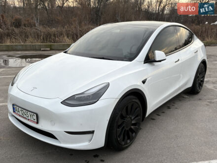 Белый Тесла Model Y, объемом двигателя 0 л и пробегом 79 тыс. км за 24000 $, фото 1 на Automoto.ua