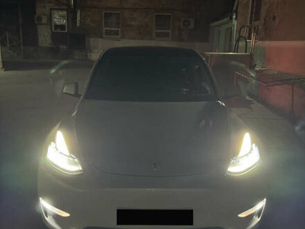 Білий Тесла Model Y, об'ємом двигуна 0 л та пробігом 60 тис. км за 28500 $, фото 1 на Automoto.ua