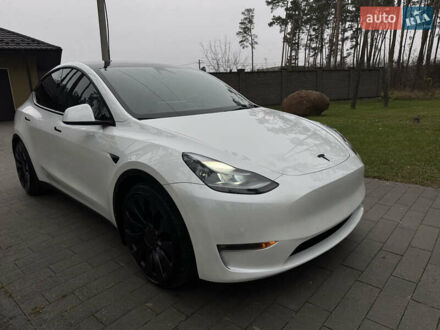 Белый Тесла Model Y, объемом двигателя 0 л и пробегом 74 тыс. км за 25700 $, фото 1 на Automoto.ua