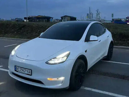 Білий Тесла Model Y, об'ємом двигуна 0 л та пробігом 59 тис. км за 32500 $, фото 1 на Automoto.ua