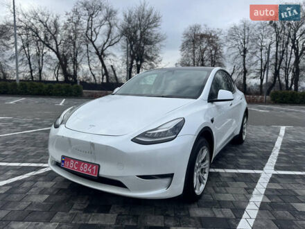 Білий Тесла Model Y, об'ємом двигуна 0 л та пробігом 100 тис. км за 23999 $, фото 1 на Automoto.ua
