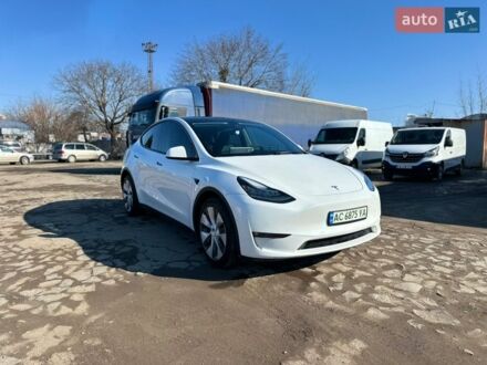 Білий Тесла Model Y, об'ємом двигуна 0 л та пробігом 51 тис. км за 25900 $, фото 1 на Automoto.ua