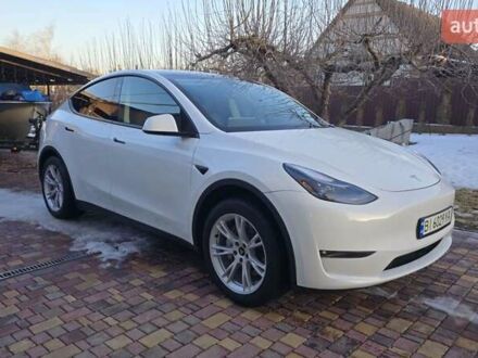Білий Тесла Model Y, об'ємом двигуна 0 л та пробігом 95 тис. км за 25999 $, фото 1 на Automoto.ua