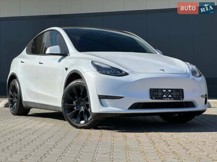 Білий Тесла Model Y, об'ємом двигуна 0 л та пробігом 52 тис. км за 23800 $, фото 1 на Automoto.ua