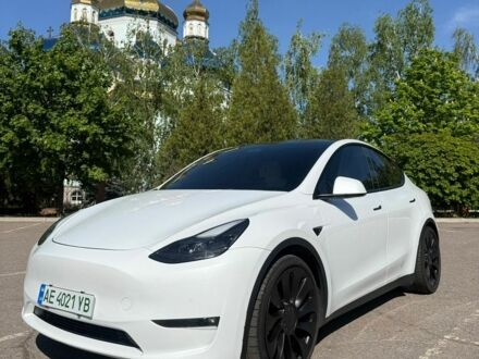 Білий Тесла Model Y, об'ємом двигуна 0 л та пробігом 59 тис. км за 28999 $, фото 1 на Automoto.ua