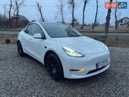 Білий Тесла Model Y, об'ємом двигуна 0 л та пробігом 112 тис. км за 28999 $, фото 1 на Automoto.ua