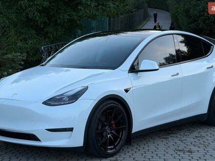 Белый Тесла Model Y, объемом двигателя 0 л и пробегом 105 тыс. км за 24000 $, фото 1 на Automoto.ua