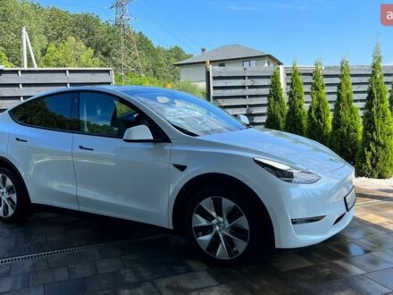 Білий Тесла Model Y, об'ємом двигуна 0 л та пробігом 101 тис. км за 25499 $, фото 1 на Automoto.ua
