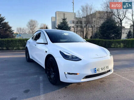 Белый Тесла Model Y, объемом двигателя 0 л и пробегом 62 тыс. км за 28000 $, фото 1 на Automoto.ua