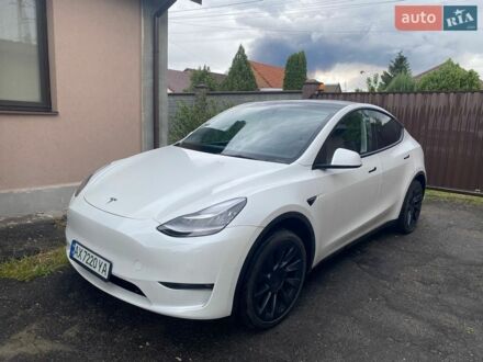 Білий Тесла Model Y, об'ємом двигуна 0 л та пробігом 62 тис. км за 24300 $, фото 1 на Automoto.ua
