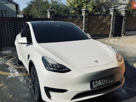 Белый Тесла Model Y, объемом двигателя 0 л и пробегом 100 тыс. км за 22999 $, фото 1 на Automoto.ua