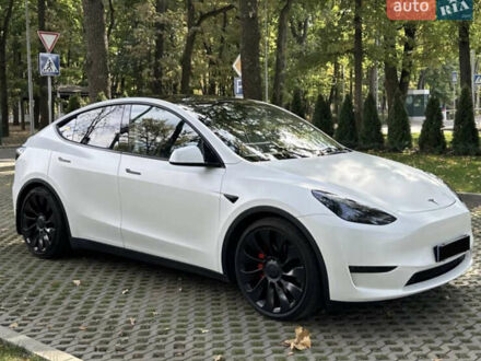 Белый Тесла Model Y, объемом двигателя 0 л и пробегом 49 тыс. км за 35000 $, фото 1 на Automoto.ua