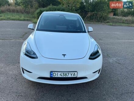 Белый Тесла Model Y, объемом двигателя 0 л и пробегом 59 тыс. км за 31999 $, фото 1 на Automoto.ua