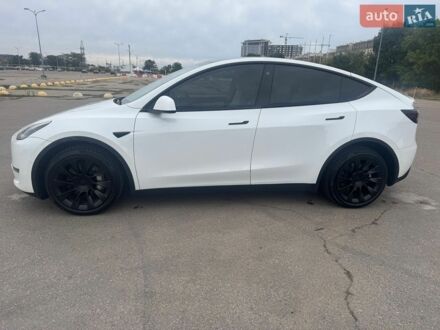 Белый Тесла Model Y, объемом двигателя 0 л и пробегом 77 тыс. км за 26900 $, фото 1 на Automoto.ua
