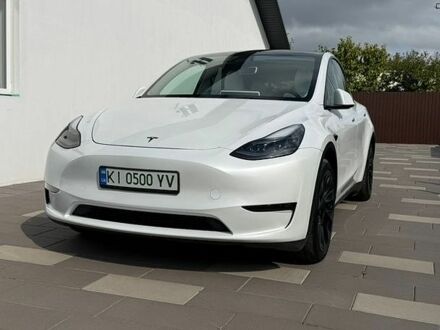 Белый Тесла Model Y, объемом двигателя 0 л и пробегом 66 тыс. км за 28000 $, фото 1 на Automoto.ua